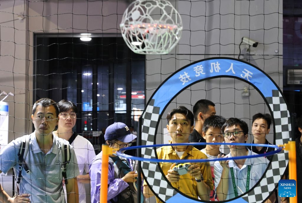 Visitors experience drone racing during the 48th WorldSkills Competition in east China's Shanghai, Sept. 24, 2026. The 48th WorldSkills Competition, currently being held at the National Exhibition and Convention Center (Shanghai), has attracted a large number of visitors. (Xinhua/Fang Zhe)