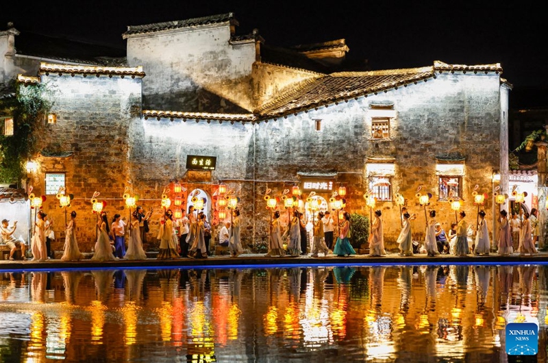 This photo taken on Sept. 24, 2026 shows performers parading with rabbit-shaped lanterns in Hongcun Village, Yixian County of Huangshan City, east China's Anhui Province. A lantern parade was held here in celebration of the Mid-Autumn Festival.

In recent years, Huangshan has been boosting its nighttime economy to unlock the local consumption potential. Photo: Xinhua