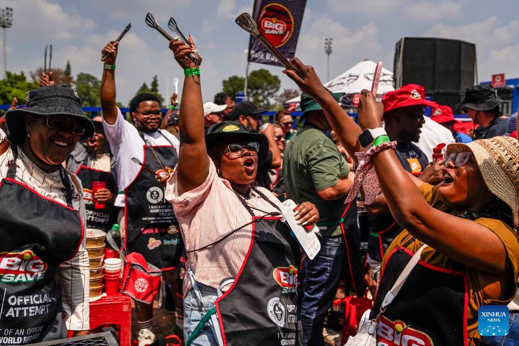 People participate in a barbecue festival at Loftus Stadium of Pretoria, South Africa, Sept. 24, 2026. The festival was held here on Thursday and attracted more than 2,000 people to participate. (Photo by Shiraaz Mohamed/Xinhua)