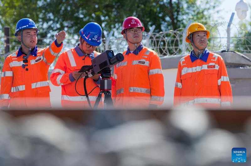 Staff member of China Railway Harbin Group Co., Ltd. conduct an emergency drill at Tieli Railway Station along the Harbin-Yichun high-speed railway in northeast China's Heilongjiang Province, Sept. 24, 2026. As the Harbin-Yichun high-speed railway, China's northernmost high-speed railway, enters the final countdown to opening, workers are carrying out intensive training, emergency drills, equipment inspections and surveying to ensure its safe operation.
With a designed speed of 250 kilometers per hour, the 318-km line will slash travel time between Harbin and Yichun from about seven hours to just two hours once it becomes operational. Photo: Xinhua