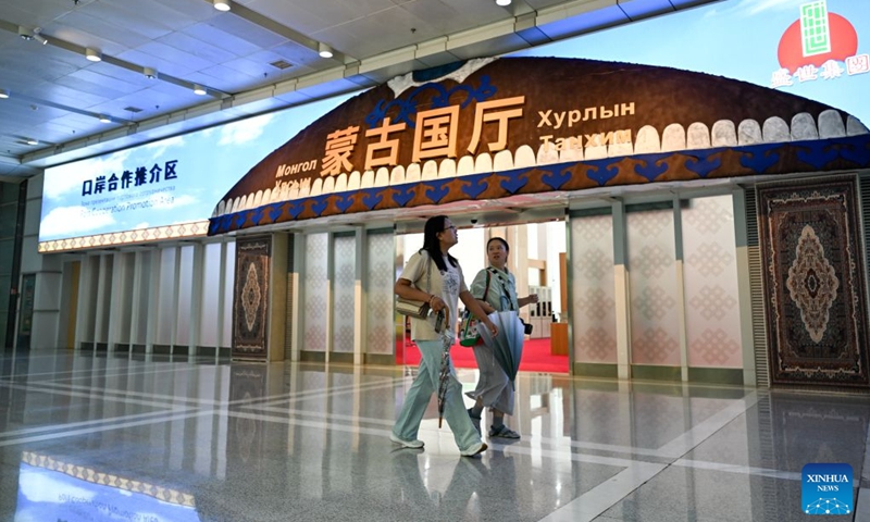 People walk past the promotion area for Mongolia at the China-SCO Port Economy Cooperation Center in Tianjin, north China, Sept. 8, 2026. Tianjin is an important land-sea hub for Belt and Road cooperation. The China-SCO Port Economy Cooperation Center was inaugurated in Tianjin recently. The center aims to promote resource sharing, complementary strengths and coordinated development among ports of Shanghai Cooperation Organization (SCO) member states, while creating new opportunities for cooperation in the digital economy, port trade and related fields under the SCO framework.
In the first seven months of 2026, Tianjin's imports and exports with SCO member states totaled 29.54 billion yuan (about 4.4 billion U.S. dollars), up 8.6 percent year-on-year. The city has been actively exploring new approaches to high-level opening-up as a major gateway in northern China. Photo: Xinhua