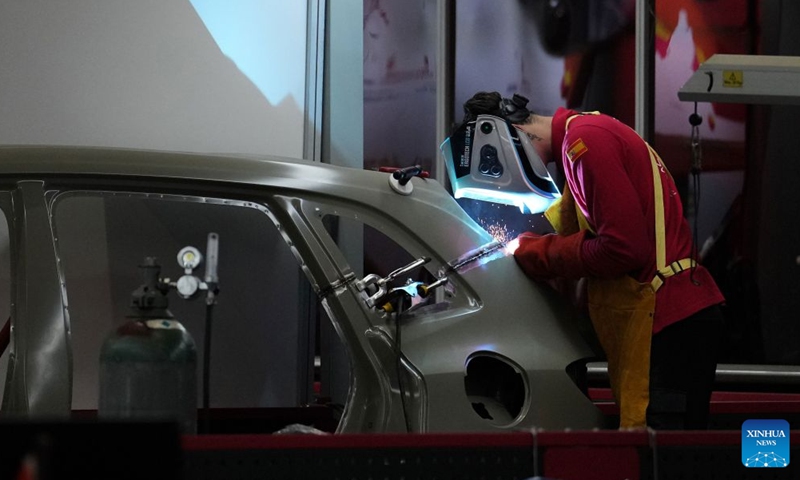 A contestant participates in the autobody repair event during the 48th WorldSkills Competition in Shanghai, east China, Sept. 25, 2026.
The 48th WorldSkills Competition is held in Shanghai from September 22 to 27.
Various events in the competition are related to the maintenance of equipment and facilities in the air, on land and on rails. (Xinhua/Ren Pengfei)