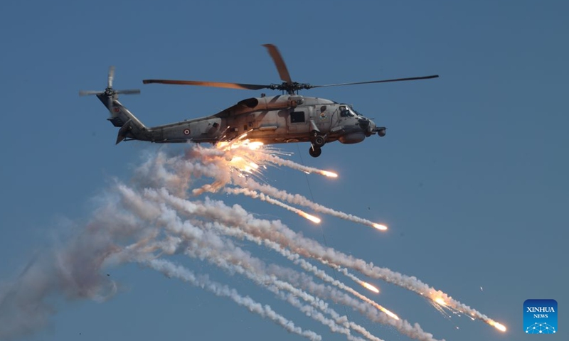 A helicopter is pictured during the Denizkurdu-I/2026 exercise in Mugla, Türkiye, on Sept. 24, 2026. The Denizkurdu-I/2026 exercise is being held from Sunday to Friday in the Black Sea, Marmara Sea, Aegean Sea and the Eastern Mediterranean. Approximately 14,000 personnel, 100 surface vessels and 50 aircraft participated in the exercise. (Mustafa Kaya/Handout via Xinhua)