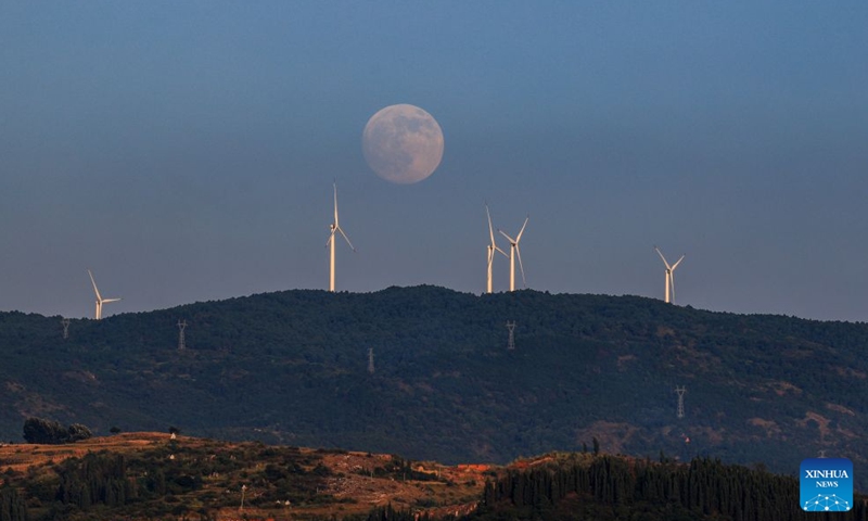 This photo taken on Sept. 25, 2026 shows the mid-autumn moon over Qujing City, southwest China's Yunnan Province. The Mid-Autumn Festival falls on Sept. 25 this year. (Photo by Sun Wenlai/Xinhua)