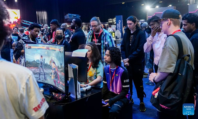 People play computer games at Comic Con Africa 2026 in Johannesburg, South Africa, Sept. 25, 2026. The event is held here from Sept. 24 to 27. (Photo by Shiraaz Mohamed/Xinhua)