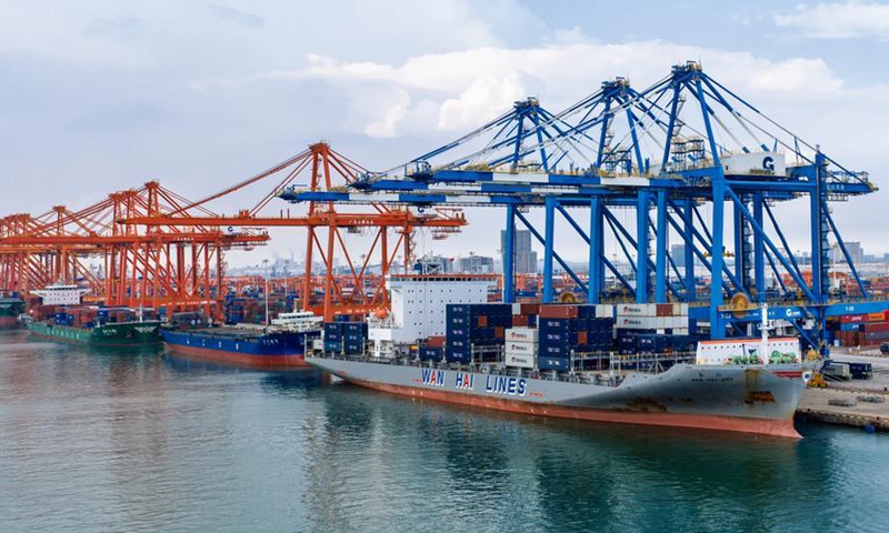 A drone photo taken on Sept. 7, 2026 shows cargo ships loading at the Qinzhou Port in Qinzhou, south China's Guangxi Zhuang Autonomous Region. (Xinhua/Zhang Ailin)