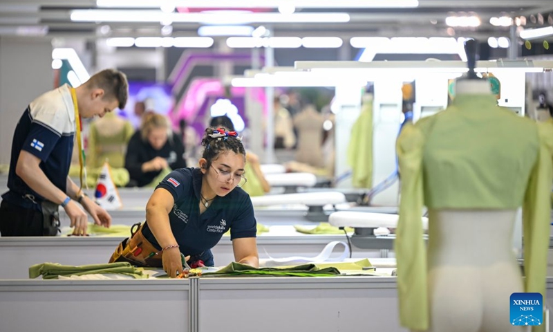 Contestants participate in the fashion technology event during the 48th WorldSkills Competition in Shanghai, east China, Sept. 26, 2026. The 48th WorldSkills Competition opened in Shanghai on Tuesday evening, with 1,385 competitors from 68 countries and regions vying in 64 skill events.
China has sent 71 competitors, who will compete in all 64 events, covering six sectors -- transportation and logistics, construction and building technology, manufacturing and engineering technology, information and communication technology, creative arts and fashion, and social and personal services, according to organizers.
The competition brings together young skilled professionals from around the world to showcase their expertise and exchange experience. Photo: Xinhua