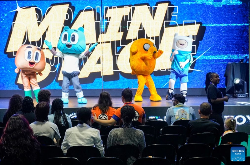 People watch a performance during Comic Con Africa 2026 in Johannesburg, South Africa, Sept. 25, 2026. The event is held here from Sept. 24 to 27. (Photo by Shiraaz Mohamed/Xinhua)