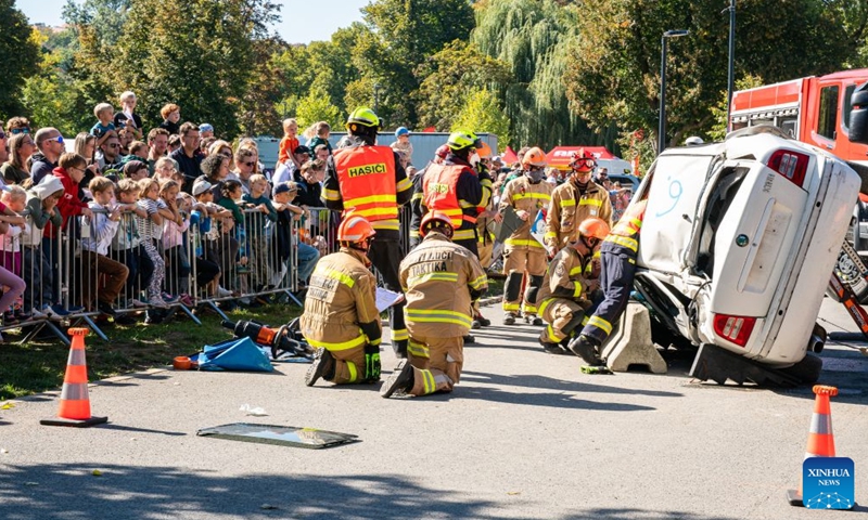 Rescuers demonstrate an emergency rescue during the Heroes' Day event in Prague, the Czech Republic, Sept. 26, 2026. The event was held in Prague on Saturday, bringing together firefighters, police officers, emergency medical personnel and representatives of other rescue, security and organizations. They showcased vehicles and equipment, demonstrated emergency response skills, and offered interactive activities to raise public preparedness for emergencies. (Photo by Dana Kesnerova/Xinhua)