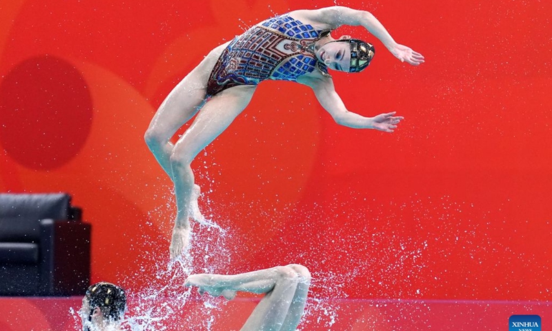 Artistic swimmers of team China compete during the mixed team acrobatic routine of Artistic Swimming at the 20th Asian Games Aichi-Nagoya 2026 in Hamamatsu of Shizuoka Prefecture, Japan, Sept. 26, 2026. (Xinhua/Zhou Mi)