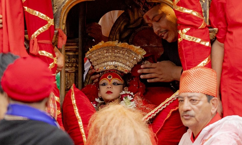 The Living Goddess Kumari is seen during the Indra Jatra festival in Kathmandu, Nepal, Sept. 25, 2026. The eight-day festival is celebrated to honor Indra, the god of rain. (Photo by Sulav Shrestha/Xinhua)