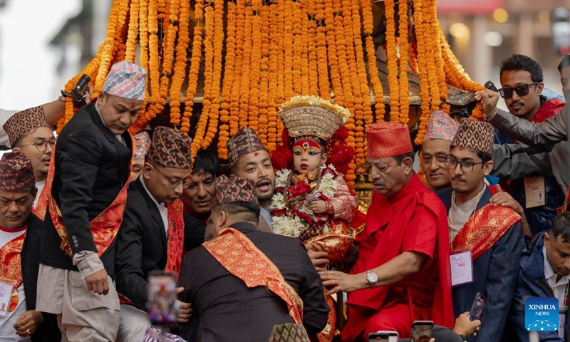 The Living Goddess Kumari is seen during the Indra Jatra festival in Kathmandu, Nepal, Sept. 25, 2026. The eight-day festival is celebrated to honor Indra, the god of rain. (Photo by Sulav Shrestha/Xinhua)