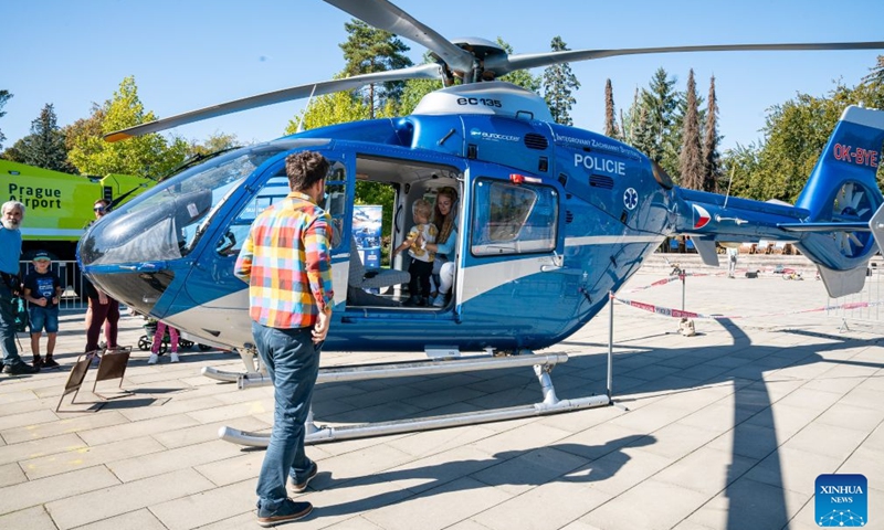 A rescue helicopter is on display during the Heroes' Day event in Prague, the Czech Republic, Sept. 26, 2026. The event was held in Prague on Saturday, bringing together firefighters, police officers, emergency medical personnel and representatives of other rescue, security and organizations. They showcased vehicles and equipment, demonstrated emergency response skills, and offered interactive activities to raise public preparedness for emergencies. (Photo by Dana Kesnerova/Xinhua)
