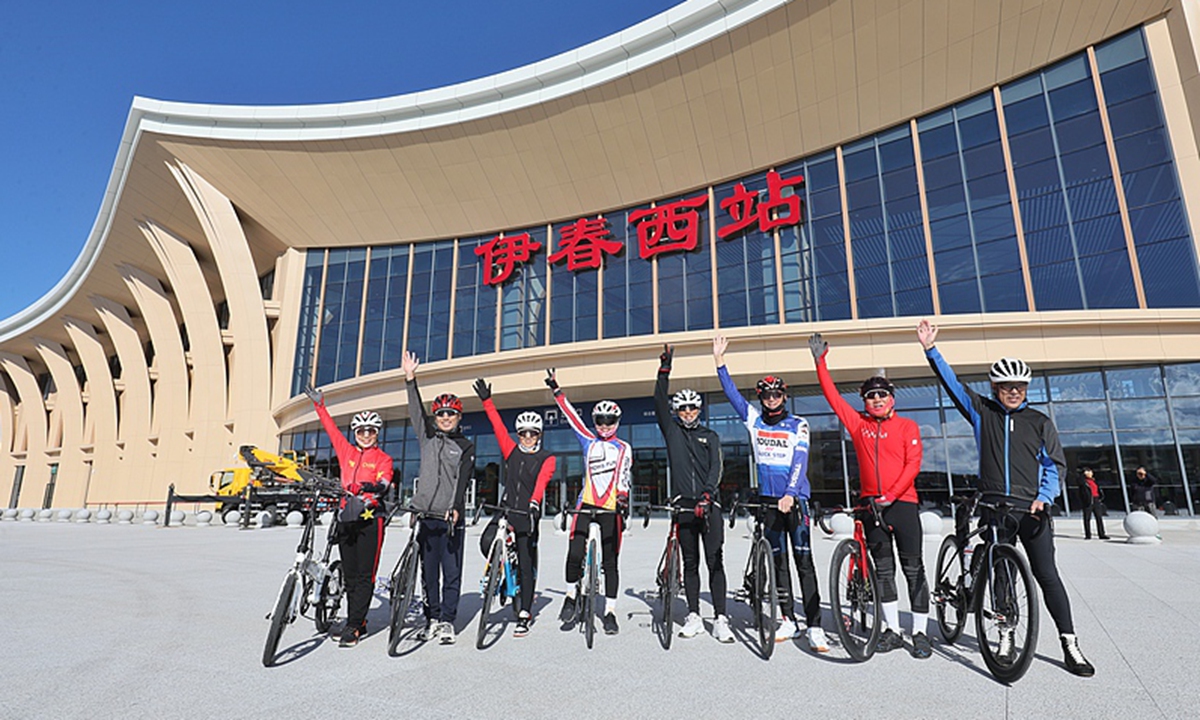 The day before the official opening of the Harbin-Yichun High-Speed Railway, residents gather at the plaza in front of Yichun West Station in Northeast China's Heilongjiang Province to take photos and celebrate the arrival of the high-speed rail era, on September 27, 2026. Photo: VCG