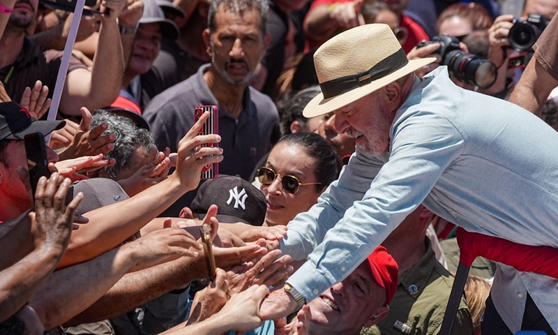 Brazilian President Luiz Inacio Lula da Silva, presidential candidate of Brazil's ruling Workers' Party, shakes hands with supporters during a campaign rally in Sao Paulo, Brazil, Sept. 26, 2026. (Photo by Paulo Lopes/Xinhua)