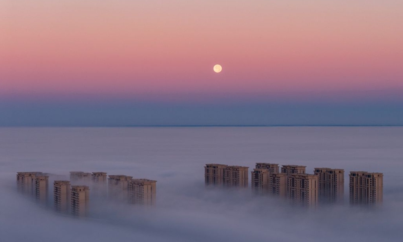 A drone photo taken on Sept. 27, 2026 shows the full moon in the sky over Zhaodong, northeast China's Heilongjiang Province. (Photo by Liu Dapeng/Xinhua)