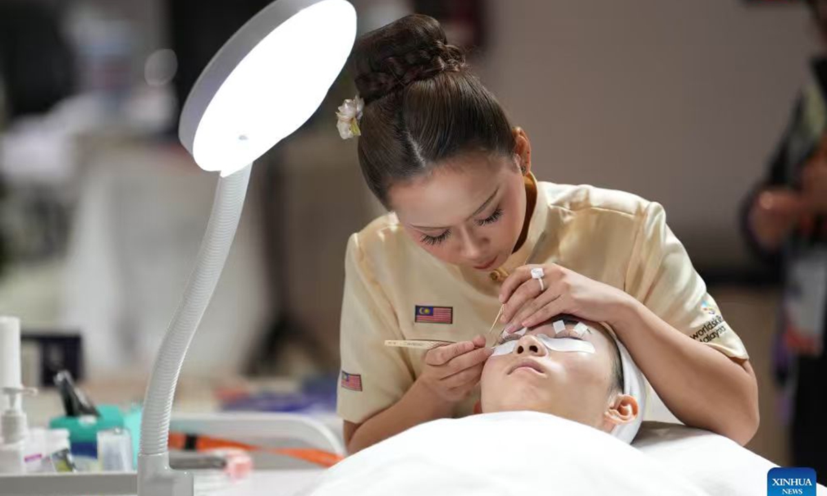 A contestant participates in the beauty therapy event during the 48th WorldSkills Competition in Shanghai on September 24, 2026. Photo: Xinhua News Agency