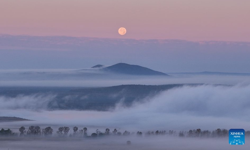 A drone photo taken on Sept. 27, 2026 shows the full moon in the sky over Heihe, northeast China's Heilongjiang Province. (Photo by Liu Chengshan/Xinhua)