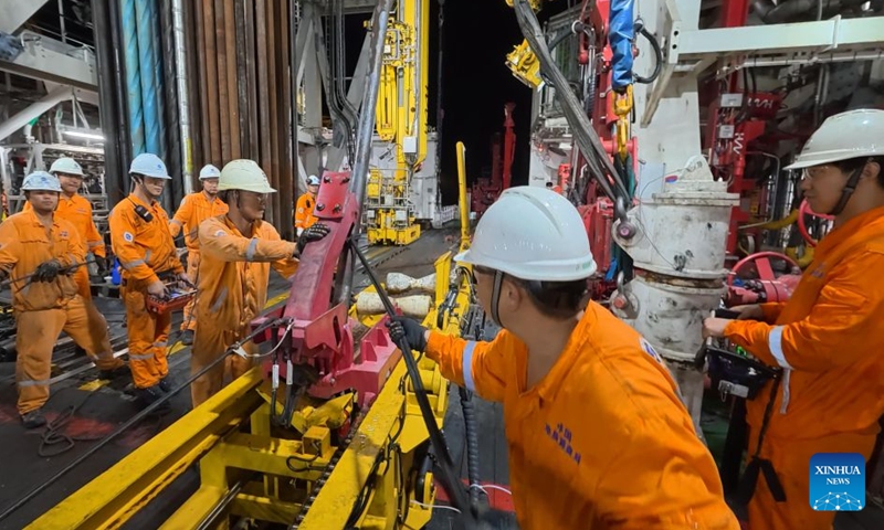 China's ocean drilling vessel Mengxiang conducts a deep-sea sample drilling operation on July 29, 2026. China's Mengxiang ocean drilling vessel has set a national record for deep-sea drilling, elevating its capability to the 5,000-meter level, after obtaining basalt samples from the South China Sea basin, the Ministry of Natural Resources said on Monday.