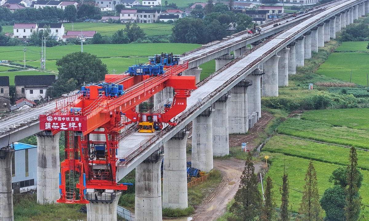 A large bridge girder erection machine operates at the construction site of the Zhangjiagang section of the Nantong-Suzhou-Jiaxing-Ningbo High-Speed Railway in East China's Jiangsu Province on September 28, 2026. The high-speed railway is an important part of the national coastal high-speed railway corridor, with a main line length of about 301 kilometers and a designed speed of 350 kilometers per hour. Photo: VCG