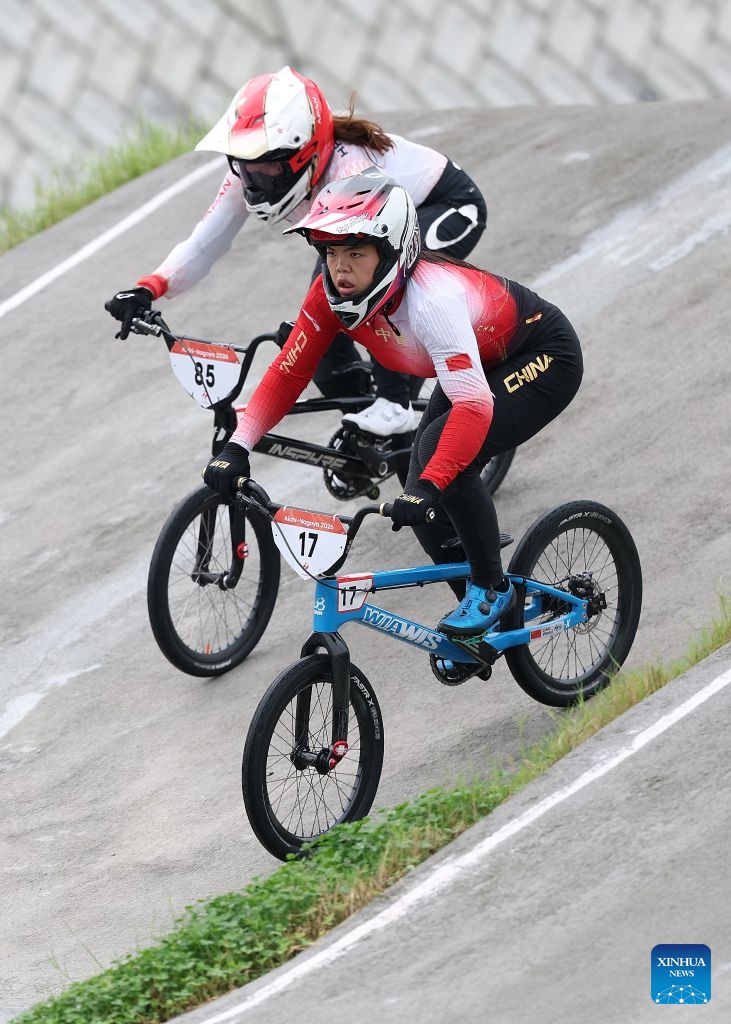 Liao Wanyi (R) of China and Hatakeyama Sae of Japan compete during the women final of cycling BMX racing at the 20th Asian Games Aichi-Nagoya 2026 in Nagoya, Japan, Sept. 28, 2026. (Xinhua/Deng Hua)

