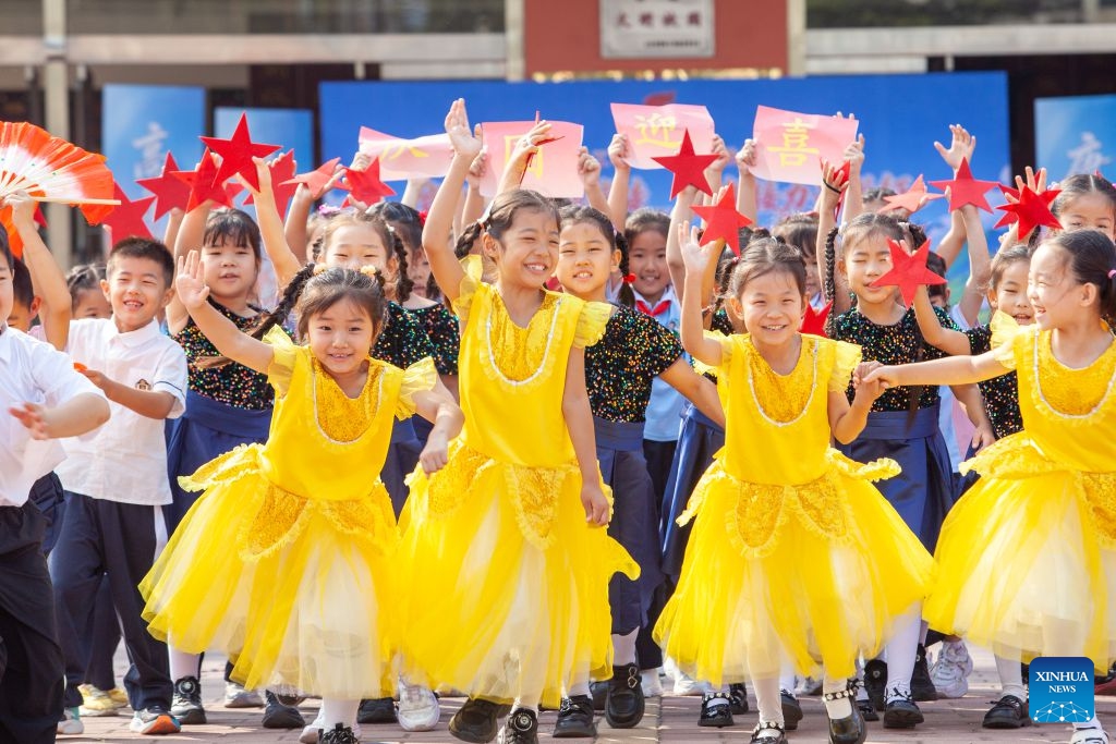Pupils attend a gathering celebrating the upcoming National Day in Gaoqing County of Zibo, east China's Shandong Province, Sept. 29, 2026. Various events are held across China in celebration of the upcoming National Day. (Photo: Xinhua)