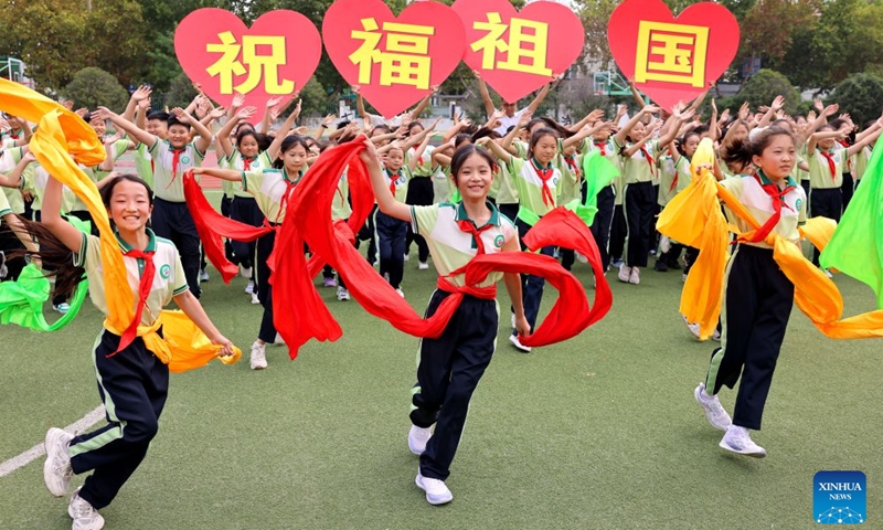 Students dance to celebrate the upcoming National Day in Shizhong District of Zaozhuang, east China's Shandong Province, Sept. 29, 2026. Various events are held across China in celebration of the upcoming National Day. (Photo: Xinhua)