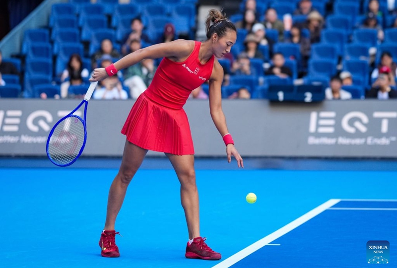 Zheng Qinwen of China prepares to serve during the women's singles round of 32 match against Marie Bouzkova of the Czech Republic at 2026 China Open tennis tournament in Beijing, China, Oct. 5, 2026. (Xinhua/Sun Fei)