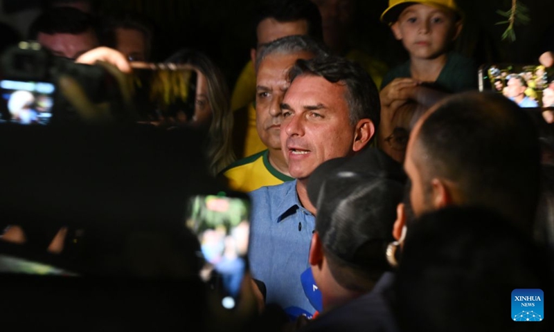 Flavio Bolsonaro (C), presidential candidate of Brazil's Liberal Party, speaks after the announcement of the first-round results of the presidential election in Brasilia, Brazil, Oct. 4, 2026.(Xinhua/Lucio Tavora)