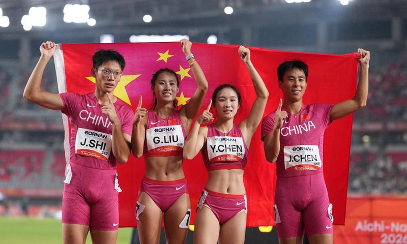 Shi Junhao, Liu Guoyi, Chen Yujie and Chen Jinfeng (L to R) of team China celebrate after the 4x100m relay mixed final of Athletics at the 20th Asian Games Aichi-Nagoya 2026 in Nagoya, Japan, Sept. 29, 2026. Photo: Xinhua
