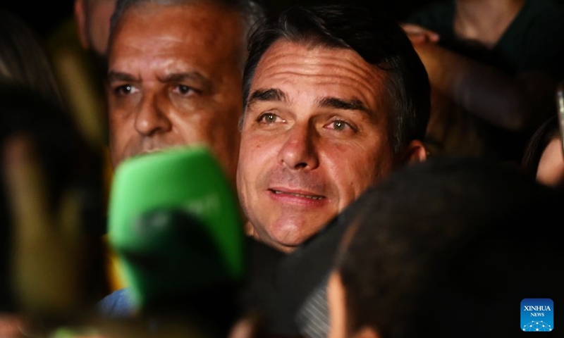 Flavio Bolsonaro (C), presidential candidate of Brazil's Liberal Party, is seen after the announcement of the first-round results of the presidential election in Brasilia, Brazil, Oct. 4, 2026. (Xinhua/Lucio Tavora)