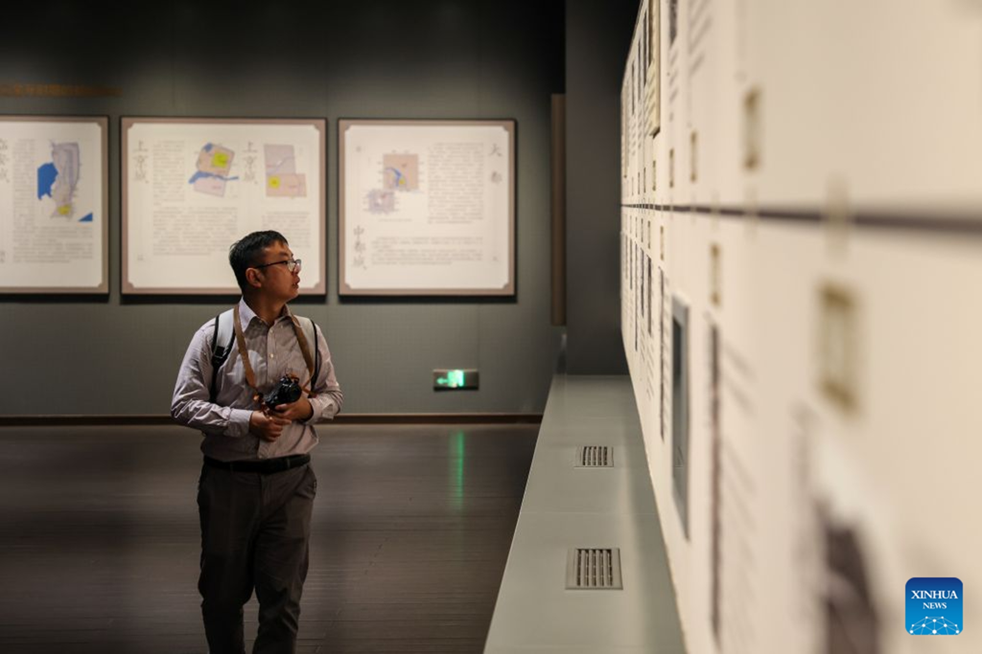 A man visits the Southern Song Dynasty Deshou Palace Ruins Museum in Hangzhou, east China's Zhejiang Province, Oct. 6, 2026. During the National Day holiday, tourists across the country visited the museum to appreciate cultural attractions. (Xinhua/Jiang Han)