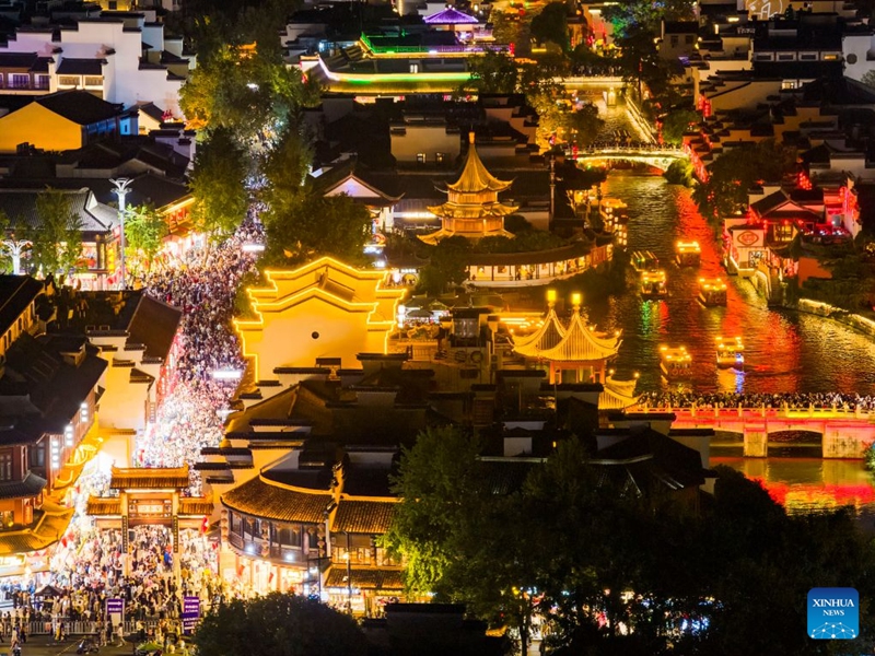 An aerial drone photo taken on Oct. 5, 2026 shows people visiting the Fuzi (Confucius) Temple scenic area in Nanjing, east China's Jiangsu Province. During the National Day holiday, night tours were launched across China to create diversified consumption scenes. Photo: Xinhua