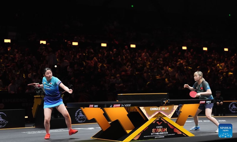 Harimoto Miwa (L) of Japan serves during the women's singles round of 32 match against Su Tsz Tung of China's Hong Kong at 2025 World Table Tennis (WTT) China Smash in Beijing, China, Oct. 6, 2026. Photo: Xinhua