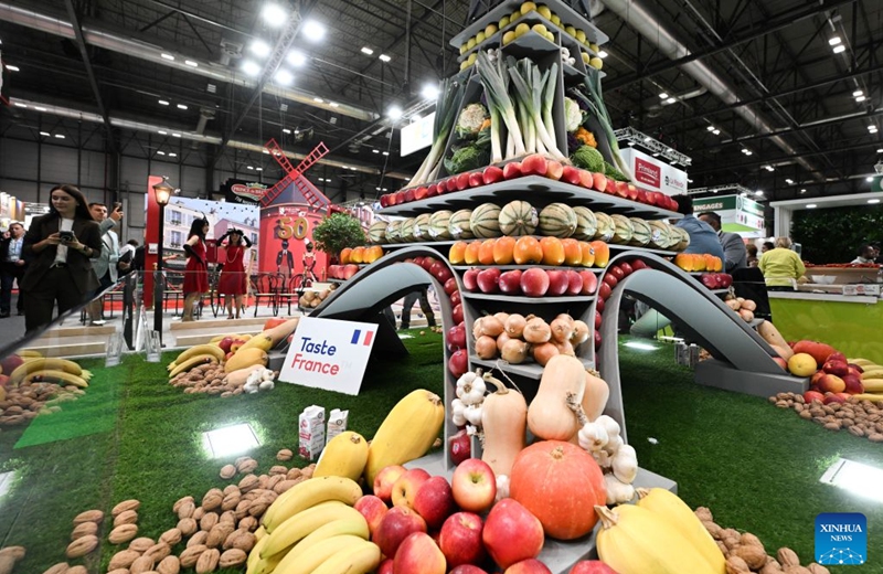 People gather before the stand of France at the IFEMA Madrid convention center for commercial negotiations at Fruit Attraction in Madrid, Spain, Oct. 6, 2026. Fruit Attraction is scheduled to take place from Oct. 6 to Oct. 8 in Madrid. Photo: Xinhua