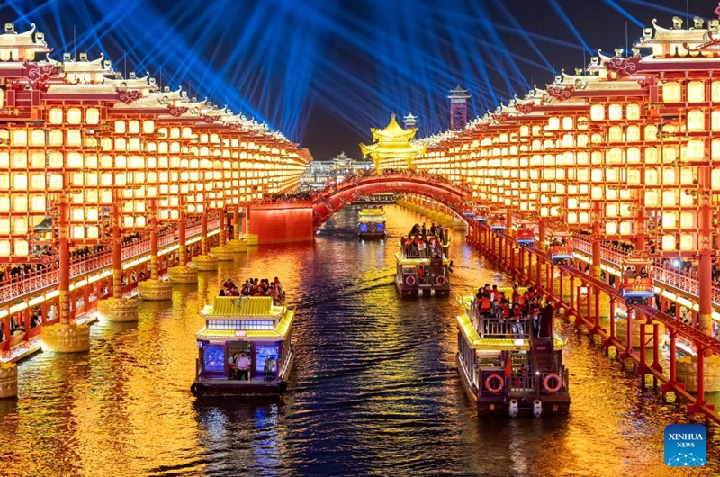 Tourists cruise the Hetou Old Street scenic area in Fengnan District of Tangshan City, north China's Hebei Province, Oct. 3, 2026. During the National Day holiday, night tours were launched across China to create diversified consumption scenes. Photo: Xinhua