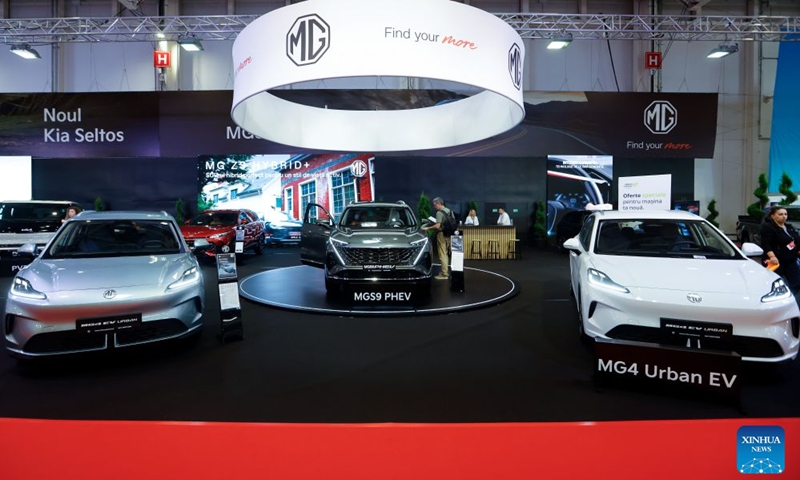 Visitors look at Chinese MG car models during the first day of Bucharest Auto Show & Accessories in Bucharest, Romania, Oct. 6, 2026. Photo: Xinhua