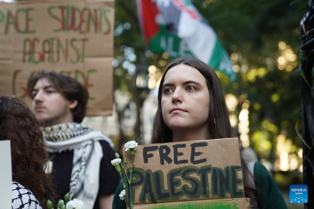 People attend a pro-Palestinian march in New York, the United States, on Oct. 7, 2026. Multiple events were held in New York city on Wednesday to mark three years since the Gaza conflict erupted on Oct. 7, 2023. (Xinhua/Zhang Fengguo)