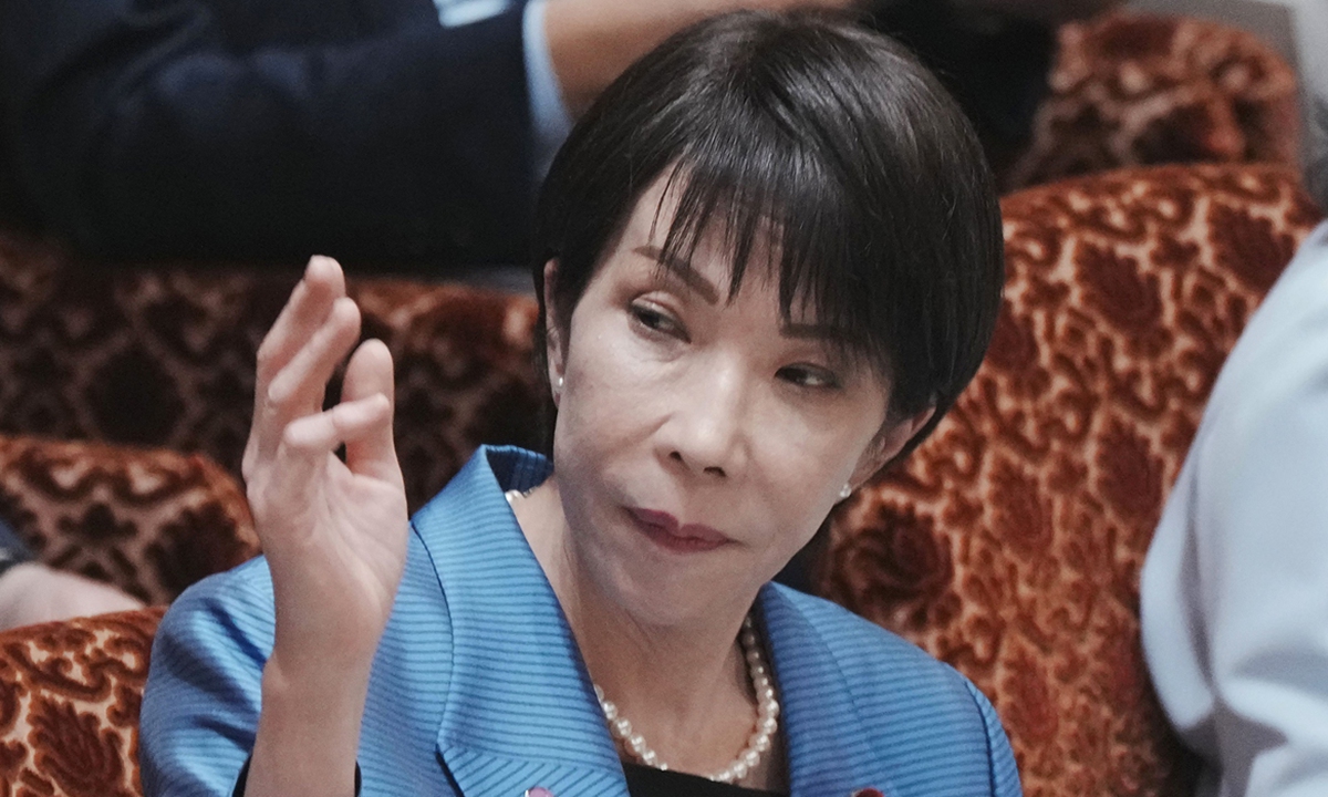 Japan's Prime Minister Sanae Takaichi raises her hand to answer a question during a session of the House of Councillors Budget Committee at the National Diet in Tokyo, Japan on November 12, 2025. Photo: VCG

