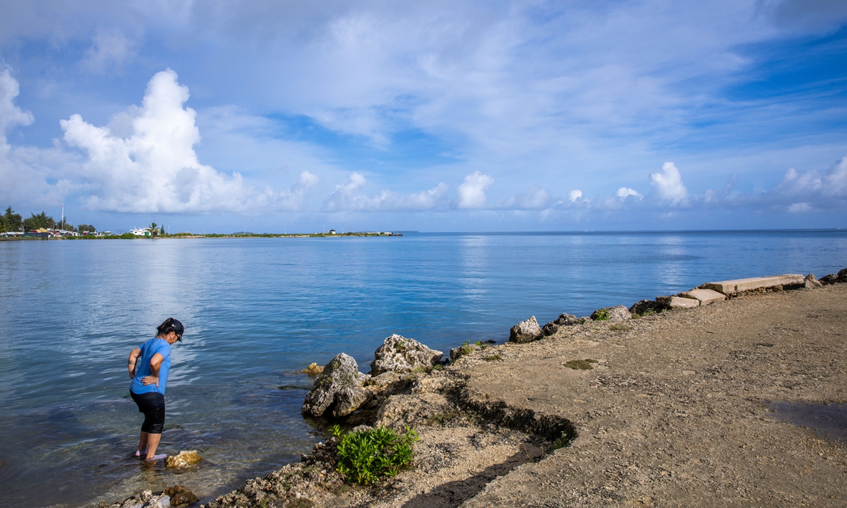 A woman stands on the coast of the South Pacific on the main island of the island state of Tonga in February 2026. Photo: VCG
