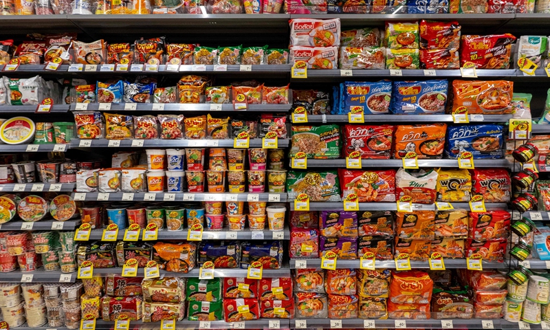Packages of instant noodles are displayed for sale at a supermarket in Bangkok on December 15, 2025. Photo: VCG