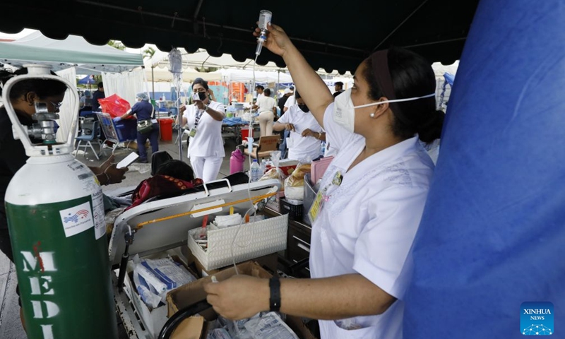 Patients receive treatment at a temporary shelter after being evacuated from a damaged hospital in Penonome, Panama, Oct. 10, 2026. Panama declared a state of emergency on Saturday to coordinate relief efforts and assist communities affected by a powerful earthquake that struck the country Friday. (Photo by Daniel Gonzalez/Xinhua)
