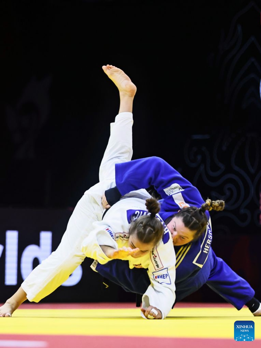 Raz Hershko (R) of Isreal fights with Helena Vukovic of Croatia during the women's +78kg bronze medal match at the 2026 World Senior Judo Championships in Baku, Azerbaijan, Oct. 10, 2026. (Xinhua/Chen Junfeng)