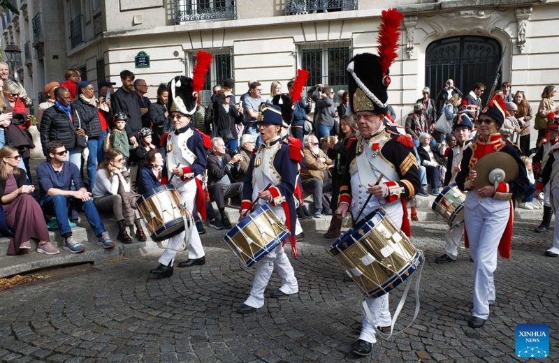 A band performs during the Montmartre Grape Harvest Festival in Paris, France, Oct. 10, 2026. The 93rd edition of the Montmartre Grape Harvest Festival runs from Oct. 7 to 11, featuring a grand parade, musical performances and other festivities. (Xinhua/Wu Huiwo)