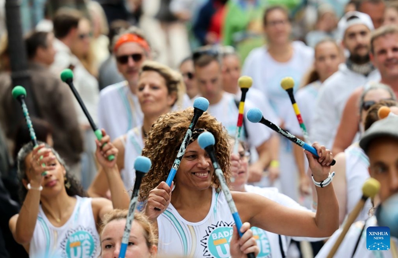 Performers take part in a parade during the Montmartre Grape Harvest Festival in Paris, France, Oct. 10, 2026. The 93rd edition of the Montmartre Grape Harvest Festival runs from Oct. 7 to 11, featuring a grand parade, musical performances and other festivities. (Xinhua/Wu Huiwo)