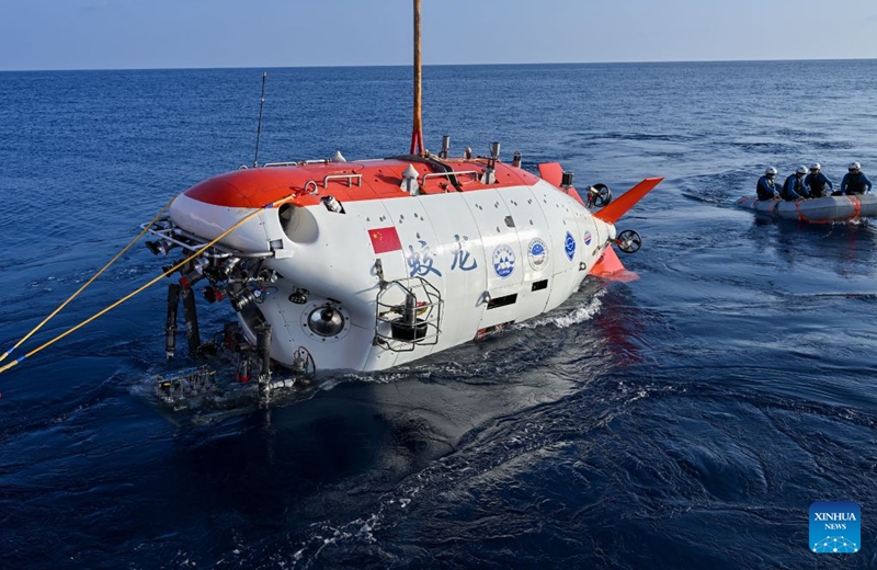 The manned deep-sea submersible Jiaolong is pictured before its dive in the western Pacific Ocean, on Oct. 10, 2026. China's research vessel Deep Sea No. 1, carrying manned deep-sea submersible Jiaolong, arrived at East Caroline Basin in the western Pacific Ocean on Saturday for deep-sea scientific research.
This marks the 466th dive of Jiaolong, with a planned diving depth of about 4,500 meters. Photo: Xinhua