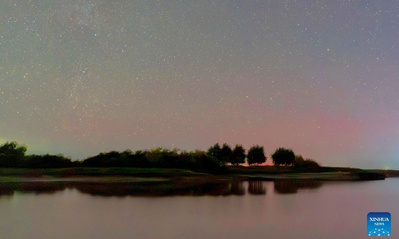 This photo taken on Oct. 11, 2026 shows the aurora observed from Shuangyashan City, northeast China's Heilongjiang Province. (Photo by Han Yang/Xinhua)

