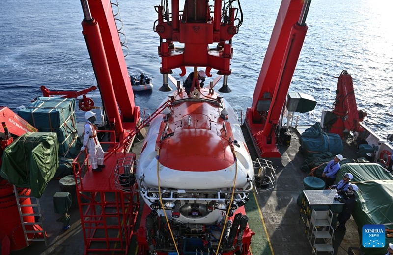 Staff members prepare the manned deep-sea submersible Jiaolong before its dive aboard the research vessel Deep Sea No. 1 in the western Pacific Ocean, on Oct. 10, 2026. China's research vessel Deep Sea No. 1, carrying manned deep-sea submersible Jiaolong, arrived at East Caroline Basin in the western Pacific Ocean on Saturday for deep-sea scientific research.
This marks the 466th dive of Jiaolong, with a planned diving depth of about 4,500 meters. Photo: Xinhua