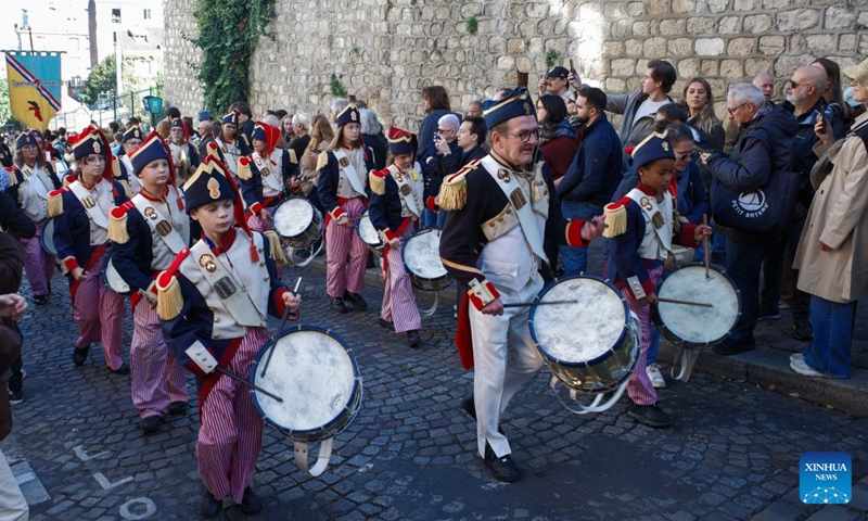 A band performs during the Montmartre Grape Harvest Festival in Paris, France, Oct. 10, 2026. The 93rd edition of the Montmartre Grape Harvest Festival runs from Oct. 7 to 11, featuring a grand parade, musical performances and other festivities. (Xinhua/Wu Huiwo)
