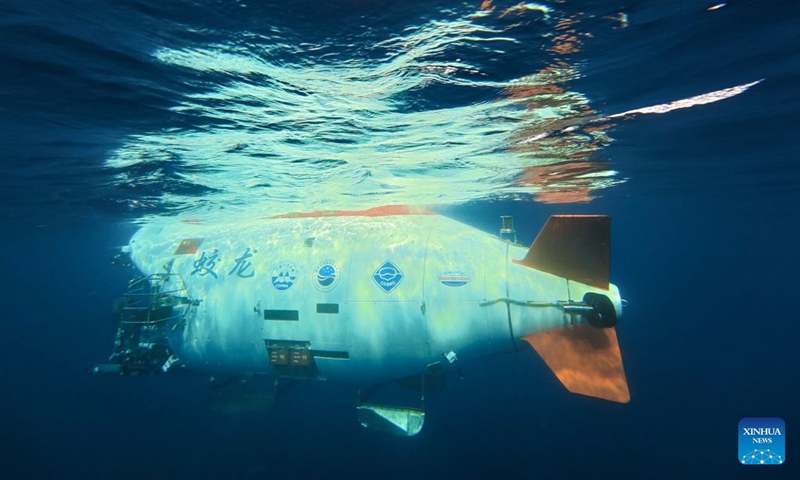 China's manned deep-sea submersible Jiaolong prepares to dive after safety inspection in the western Pacific Ocean, Oct. 10, 2026. China's research vessel Deep Sea No. 1, carrying manned deep-sea submersible Jiaolong, arrived at East Caroline Basin in the western Pacific Ocean on Saturday for deep-sea scientific research.
This marks the 466th dive of Jiaolong, with a planned diving depth of about 4,500 meters. Photo: Xinhua